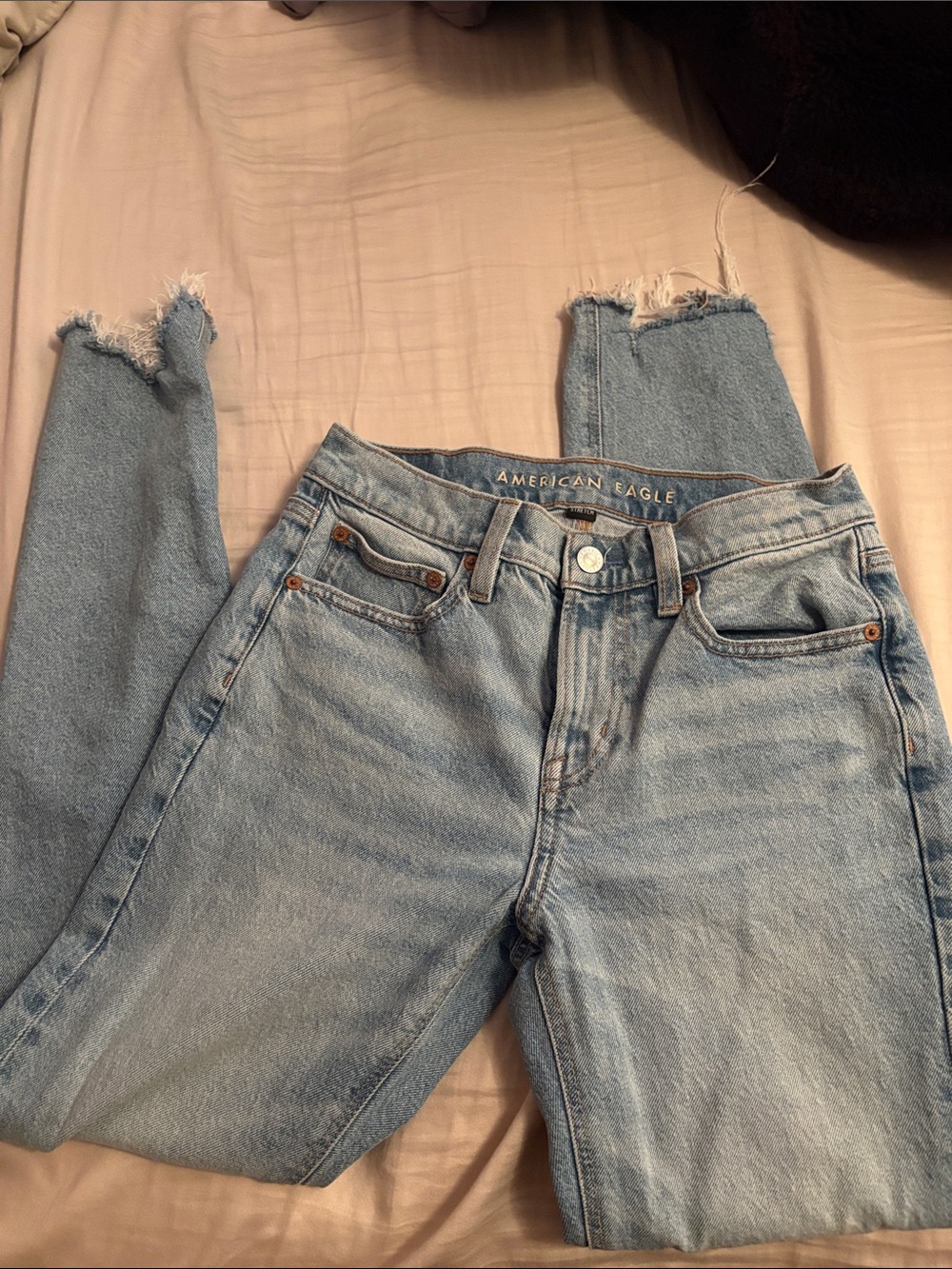 American Eagle Outfitters Light Wash Mid-Rise Frayed Hem Jeans